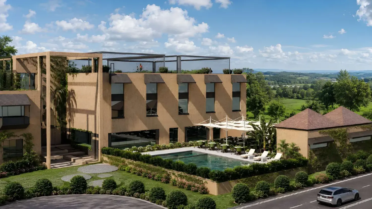 Daytime clubhouse arrival with pool terrace, landscaped lawns and road frontage.