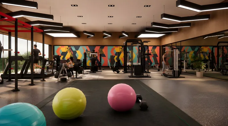 Modern gym interior with cardio and strength equipment at Saanidhya Greens.